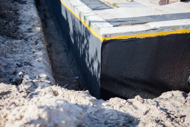 Professional Waterproofing technician working in Big Falls, WI